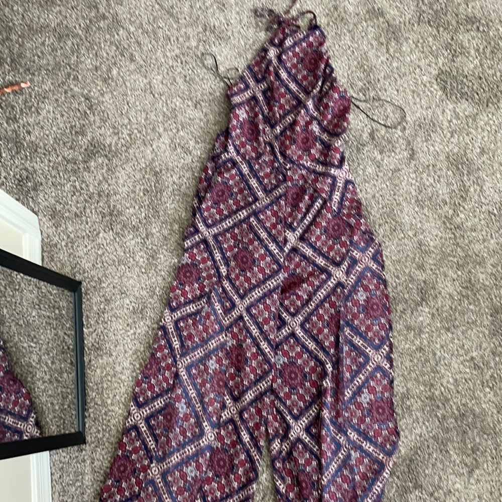 Sage jumpsuit with open back & legs. New w/ tag.